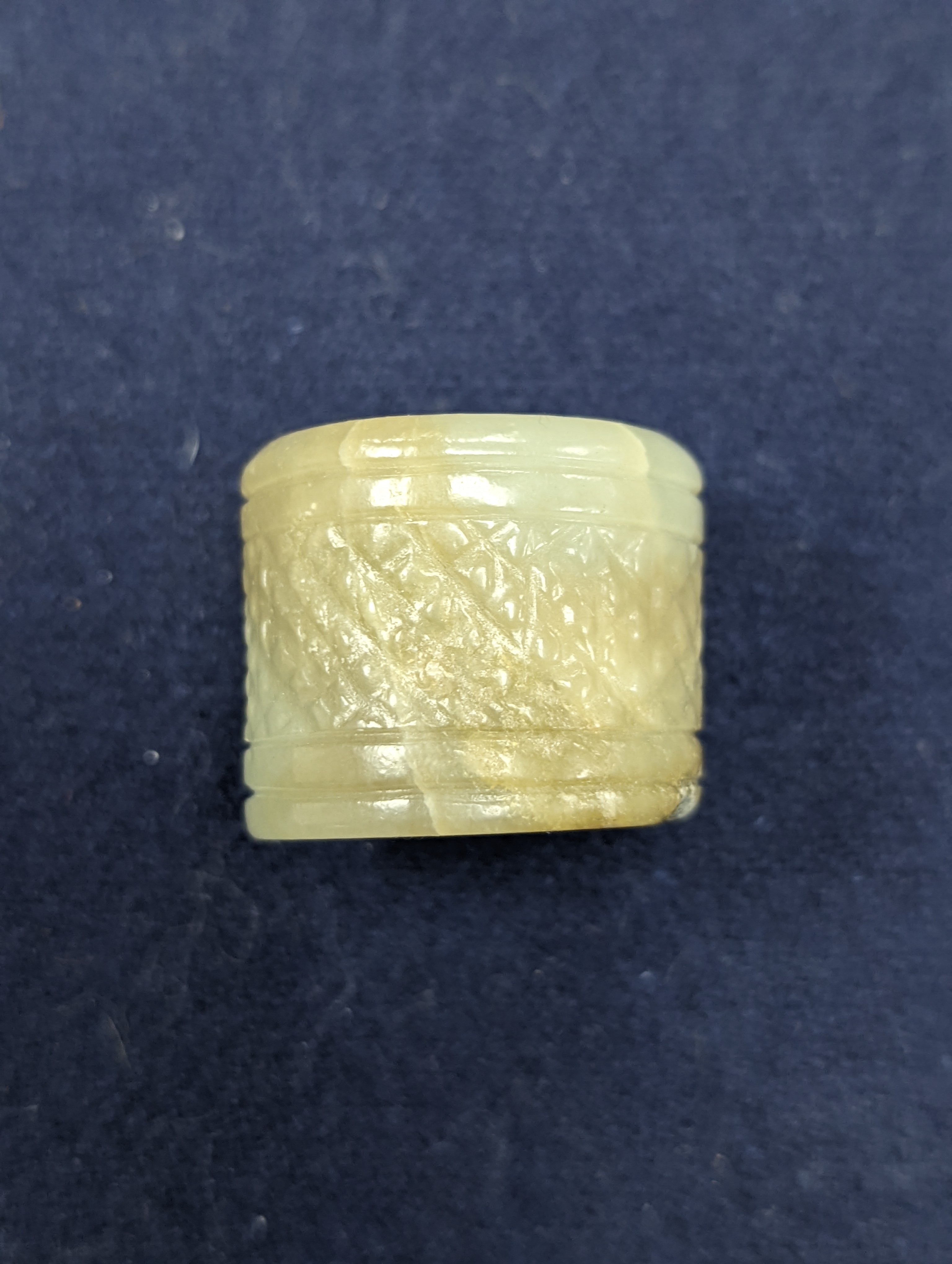 A Chinese jade belt hook, 12.5cm an archer's ring and figure, a stone cup and a glass snuff bottle